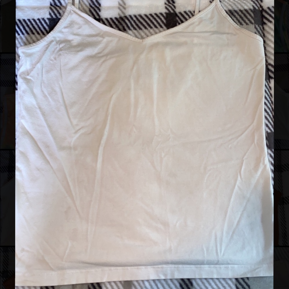 Size large white tank top.